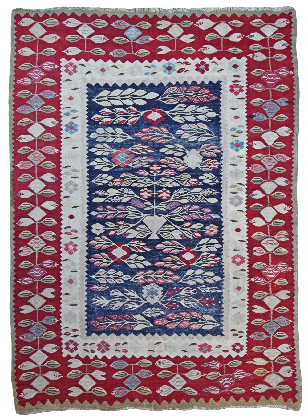 An antique Thracian wool flatweave rug with a crimson red outer frame and a dark indigo blue central panel featuring stylized botanical motifs.