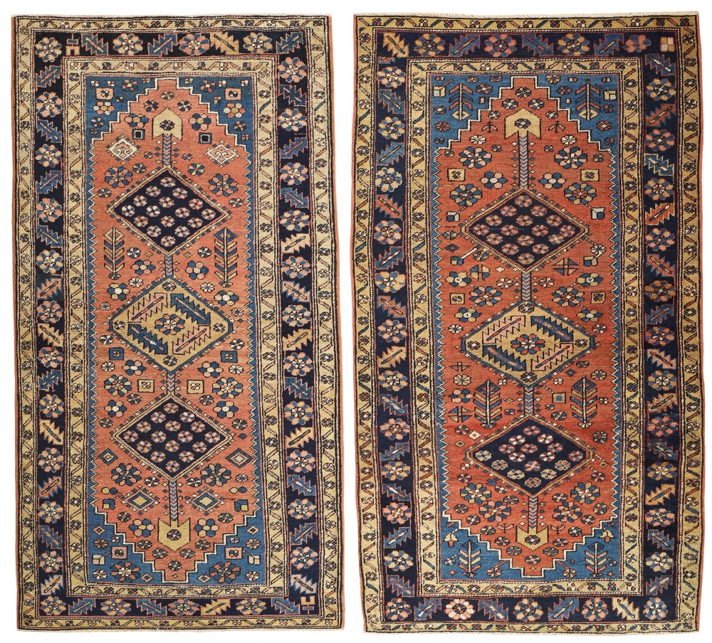 Rare pair of Antique Heriz rugs