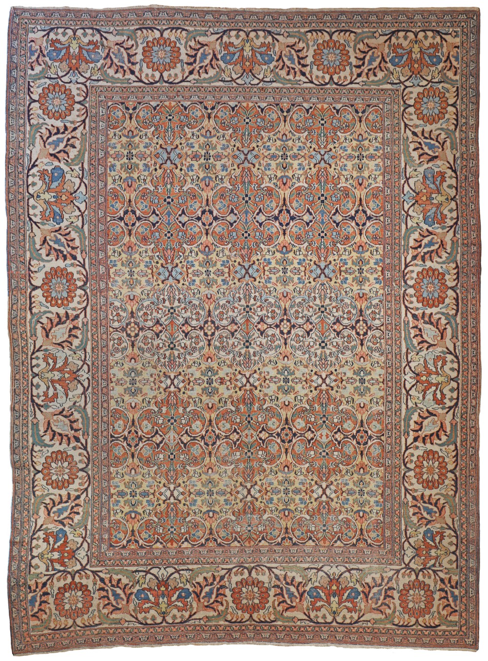 An antique hand-knotted Khorasan carpet featuring a dense all-over floral lattice pattern in terracotta, soft blue, and cream tones framed by a wide palmette border.