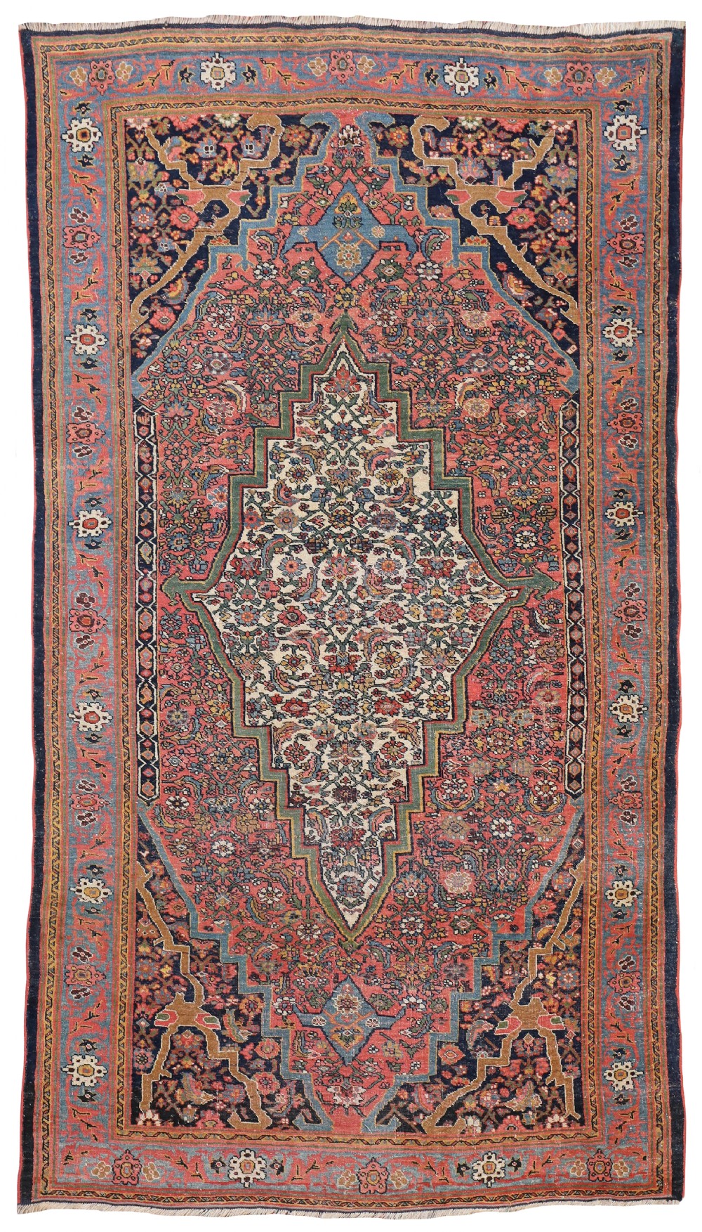 An antique Persian Bidjar hand-knotted wool rug featuring a central cream stepped medallion surrounded by terracotta red and navy blue floral motifs.