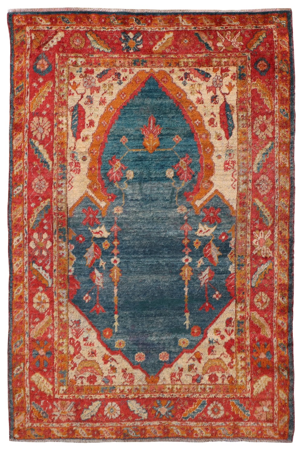 An antique hand-knotted wool rug featuring a central indigo blue medallion, cream spandrels, and a patterned terracotta border.