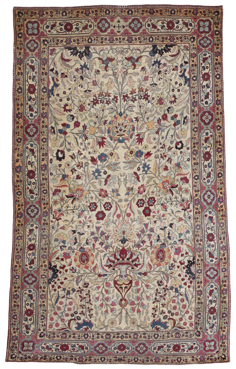 An antique hand-knotted Kirman carpet featuring an ivory central field covered in detailed floral foliage surrounded by a multi-tiered pink and blue border.