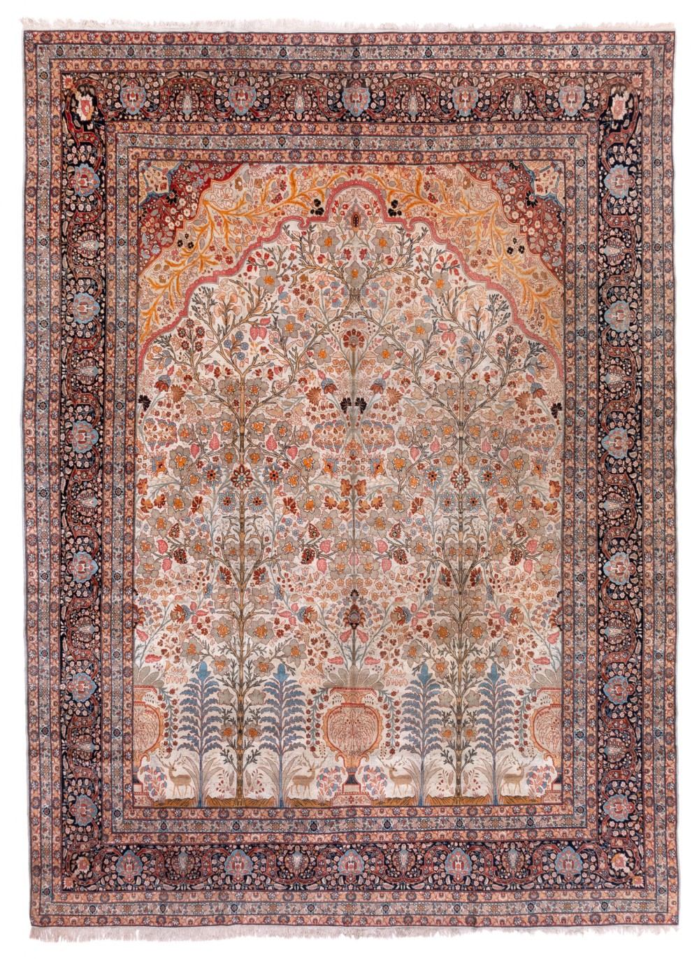 A rectangular hand-knotted Persian Tabriz carpet featuring a central cream field with a tree of life motif inside an arch, framed by a dark navy border.