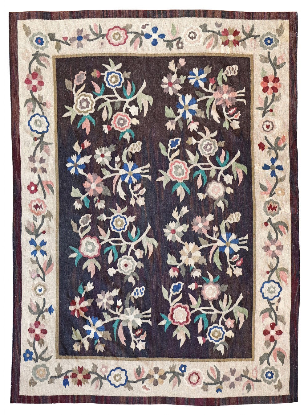 An antique flat-weave Bessarabian kilim rug featuring colourful floral sprays on a dark brown central field framed by a wide cream border with trailing floral vines.