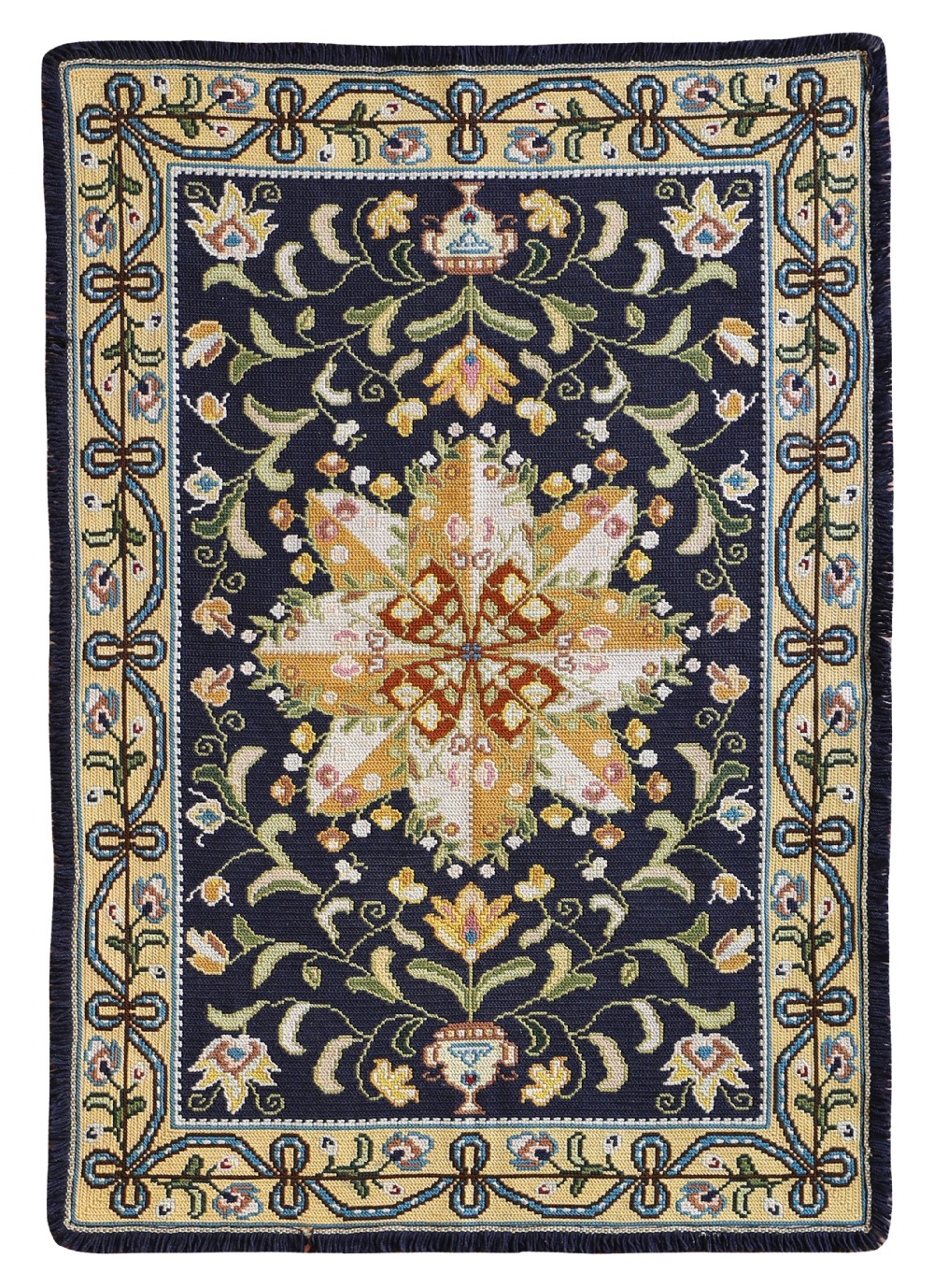 A rectangular hand-stitched Portuguese needlepoint rug featuring a navy blue field, a central yellow star medallion, floral vines, and a yellow loop border.
