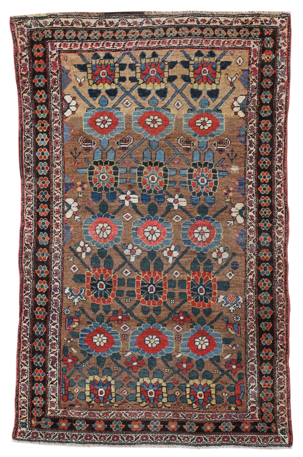 An antique rectangular Bidjar wool rug featuring a central camel-brown field woven with a dark blue geometric floral lattice motif and bordered by multiple intricate decorative bands.