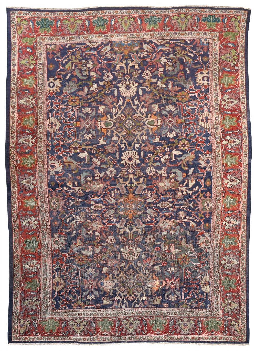 An antique hand-knotted Sultanabad carpet with a navy blue field featuring all-over floral palmette motifs framed by a wide terracotta patterned border.