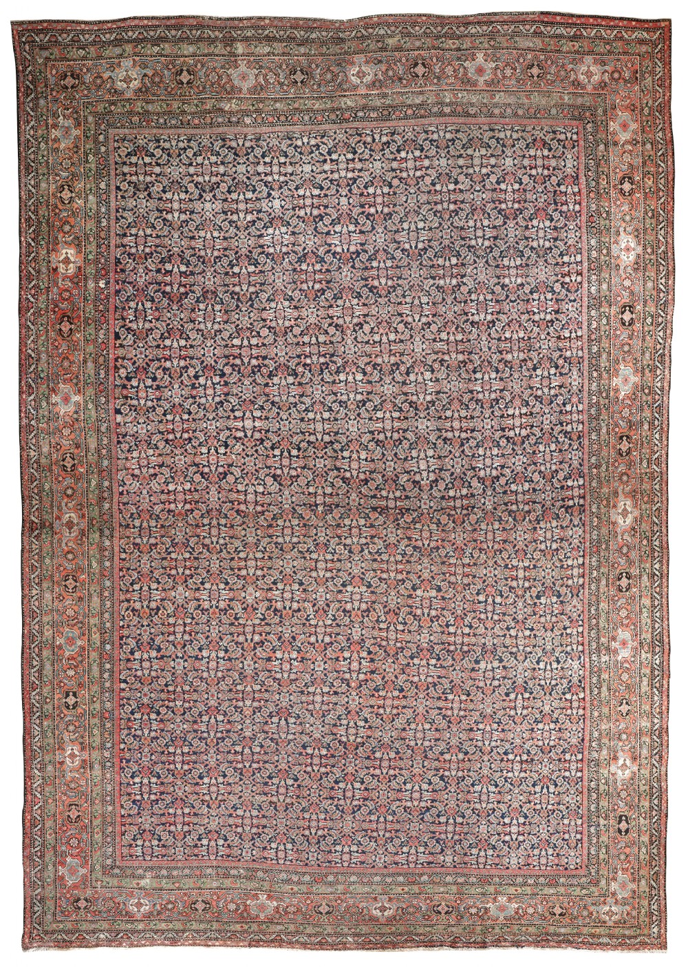 An antique hand-knotted Farahan carpet featuring an intricate repeating floral lattice pattern in terracotta, navy blue, and sage green with detailed multi-layered borders.