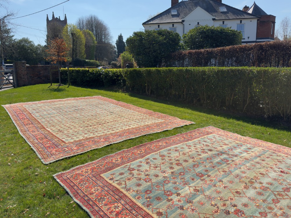 A large hand-knotted Persian Mahal carpet featuring a light blue field with an all-over red lattice floral pattern enclosed by a multi-tiered terracotta border. View XIX