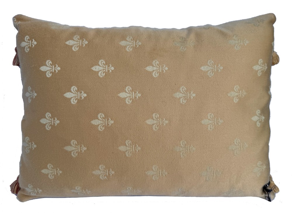 A rectangular tapestry cushion displaying a woven floral motif in beige, pink, and green tones with a fringed tassel border. View II