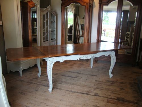 fig 1. FRENCH WALNUT EXTENDING DINING TABLE
