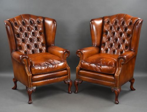 Pair of Leather Wing Back Armchairs
