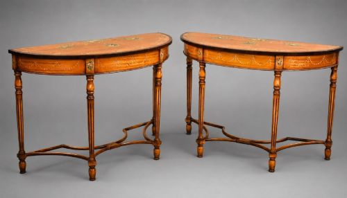 A Fine Pair of Sheraton Revival Painted Satinwood Demi-lune Console Tables