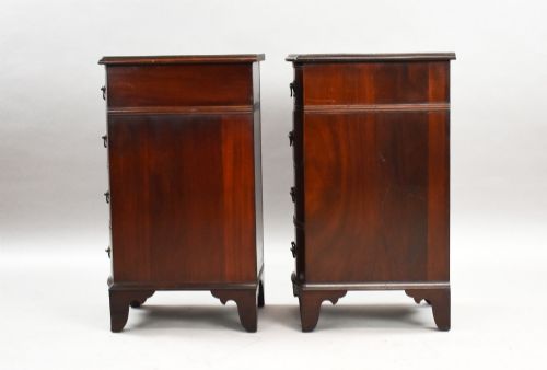 fig 3. A pair of narrow mahogany bow-front bedside chests featuring four drawers each with brass drop handles and bracket feet.