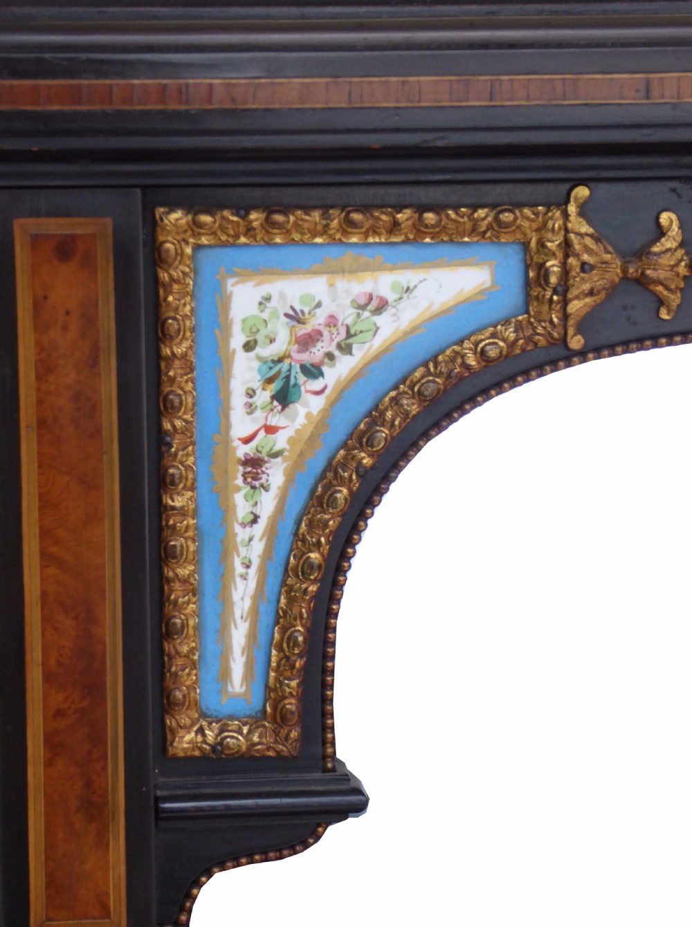 An ebonised and walnut 19th-century Bonheur du Jour writing desk featuring porcelain plaque inserts, gilded mounts, mirrors, and lower tier shelves. View VII