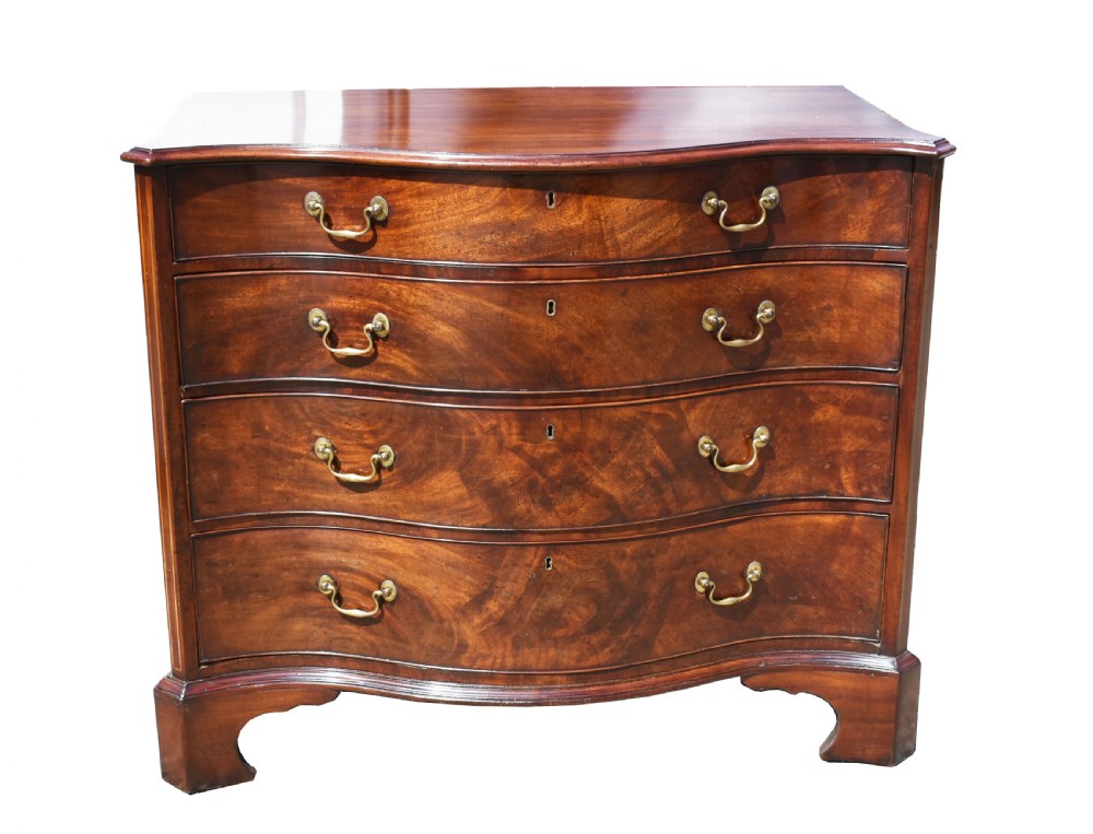 George III Mahogany Serpentine Chest View II