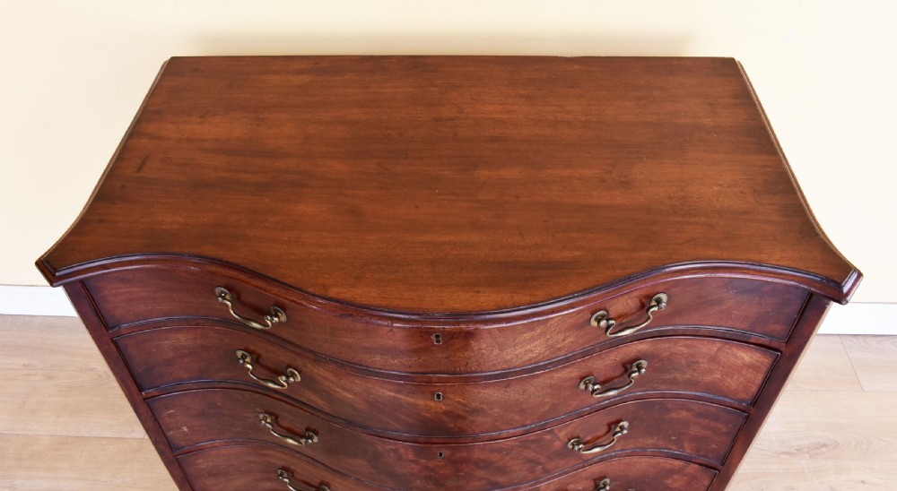 George III Mahogany Serpentine Chest View IX