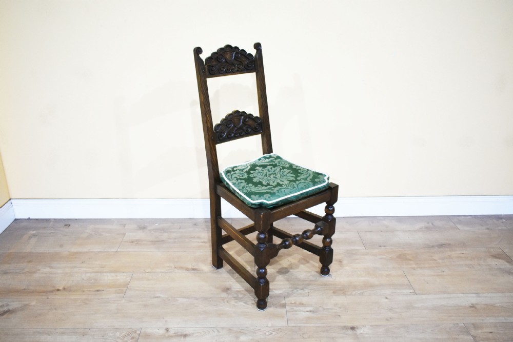 Set of 12 Carved Oak Dining Chairs View III