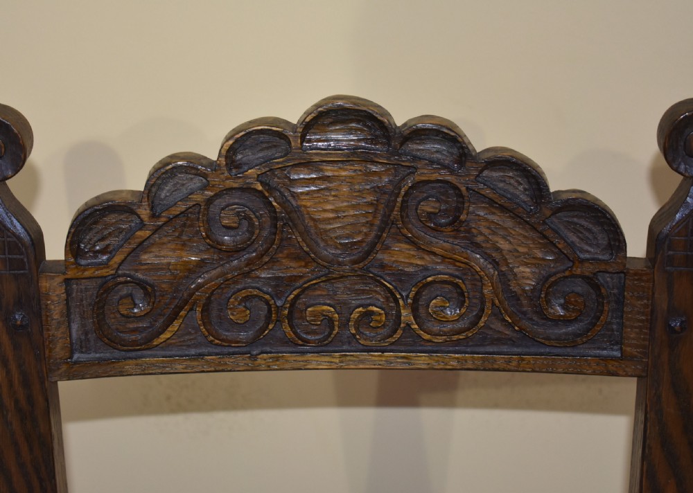 Set of 12 Carved Oak Dining Chairs View VII