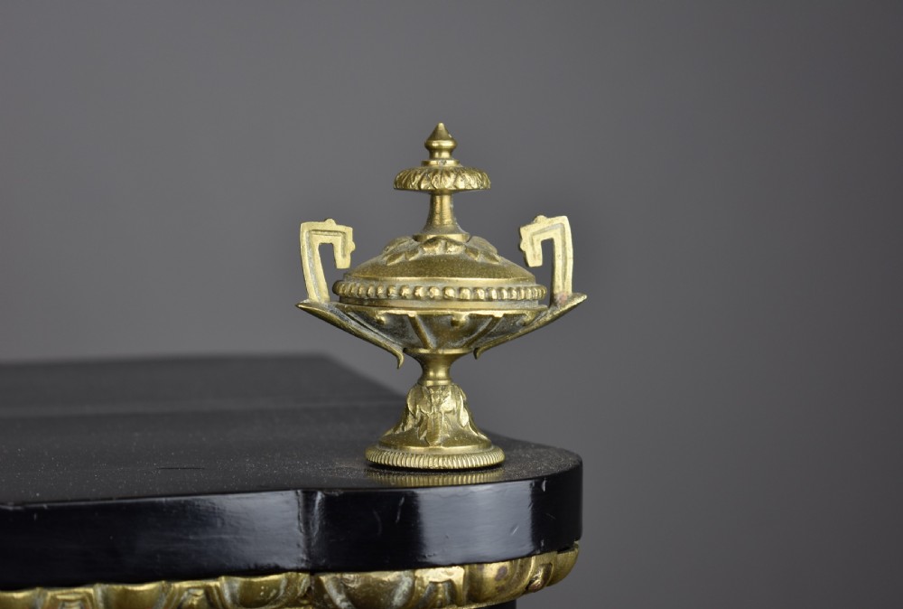 A 19th-century ebonised French bonheur du jour writing desk featuring red tortoiseshell and brass Boulle marquetry, cabriole legs, and gilt-bronze mounts. View VII