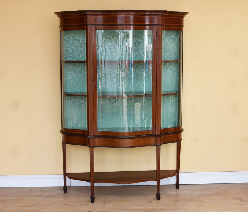 20th Century Edwardian Mahogany Inlaid Serpentine Display Cabinet