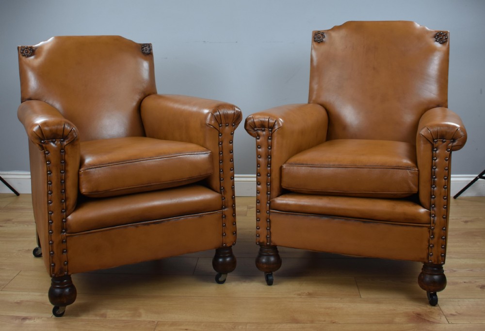 Pair Victorian Tan Leather Ladies and Gents armchairs View II