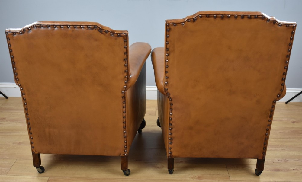 Pair Victorian Tan Leather Ladies and Gents armchairs View V