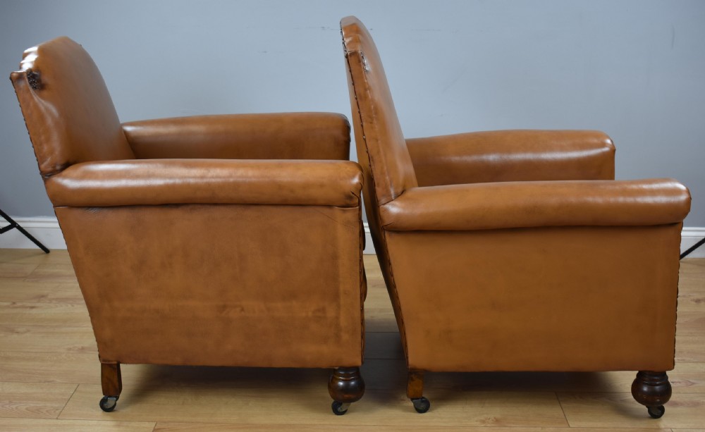 Pair Victorian Tan Leather Ladies and Gents armchairs View VII