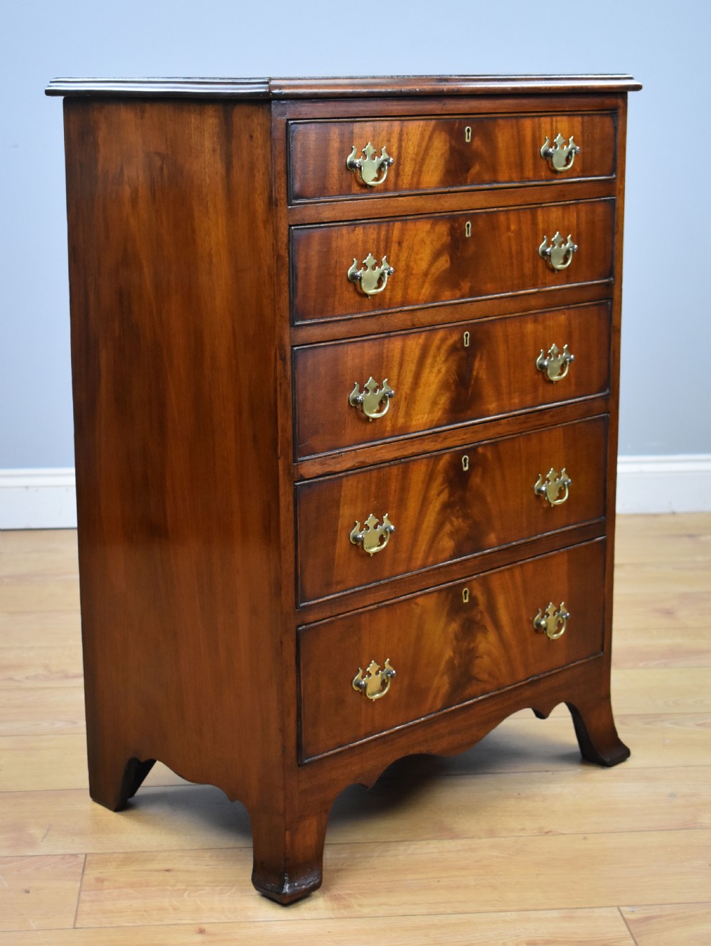 Antique Flame Mahogany Chest of Drawers