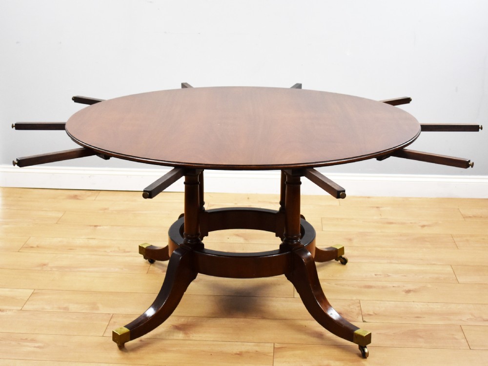 Large Mahogany Circular Extending Dining Table View II