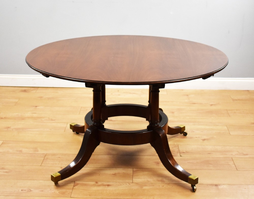 Large Mahogany Circular Extending Dining Table View III