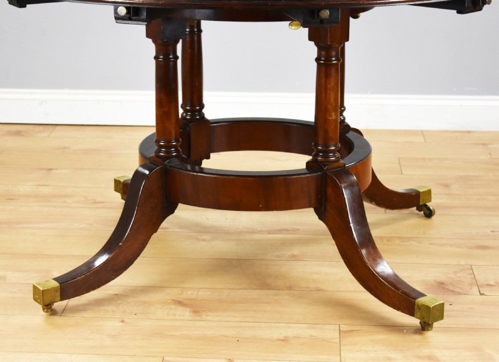 Large Mahogany Circular Extending Dining Table View VI