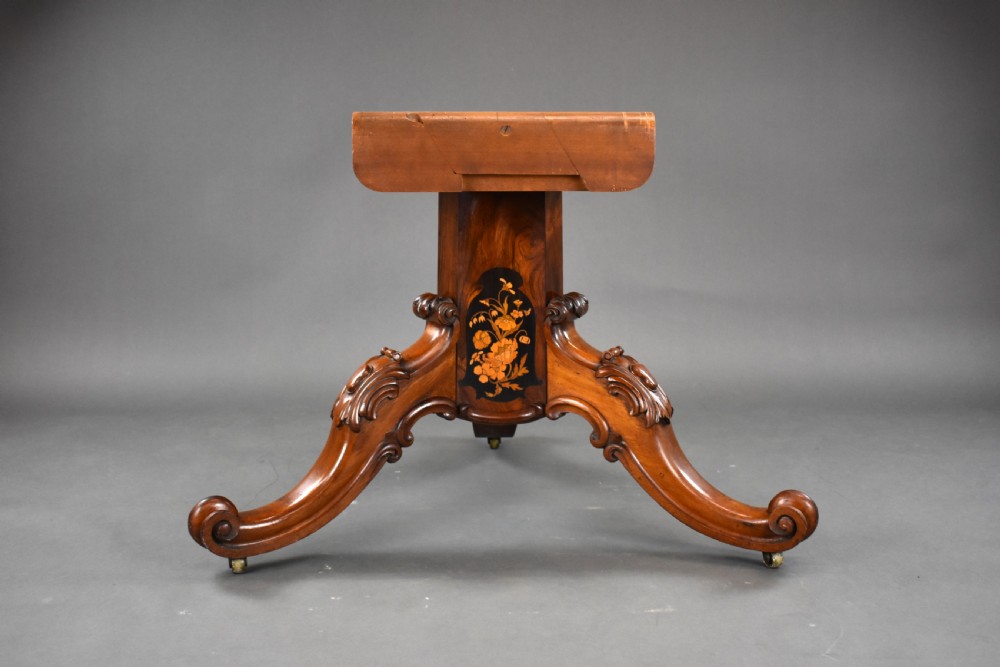 A Victorian burr walnut tilt-top breakfast table featuring a scalloped edge, intricate floral marquetry inlay border, and a carved four-star pedestal base. View X
