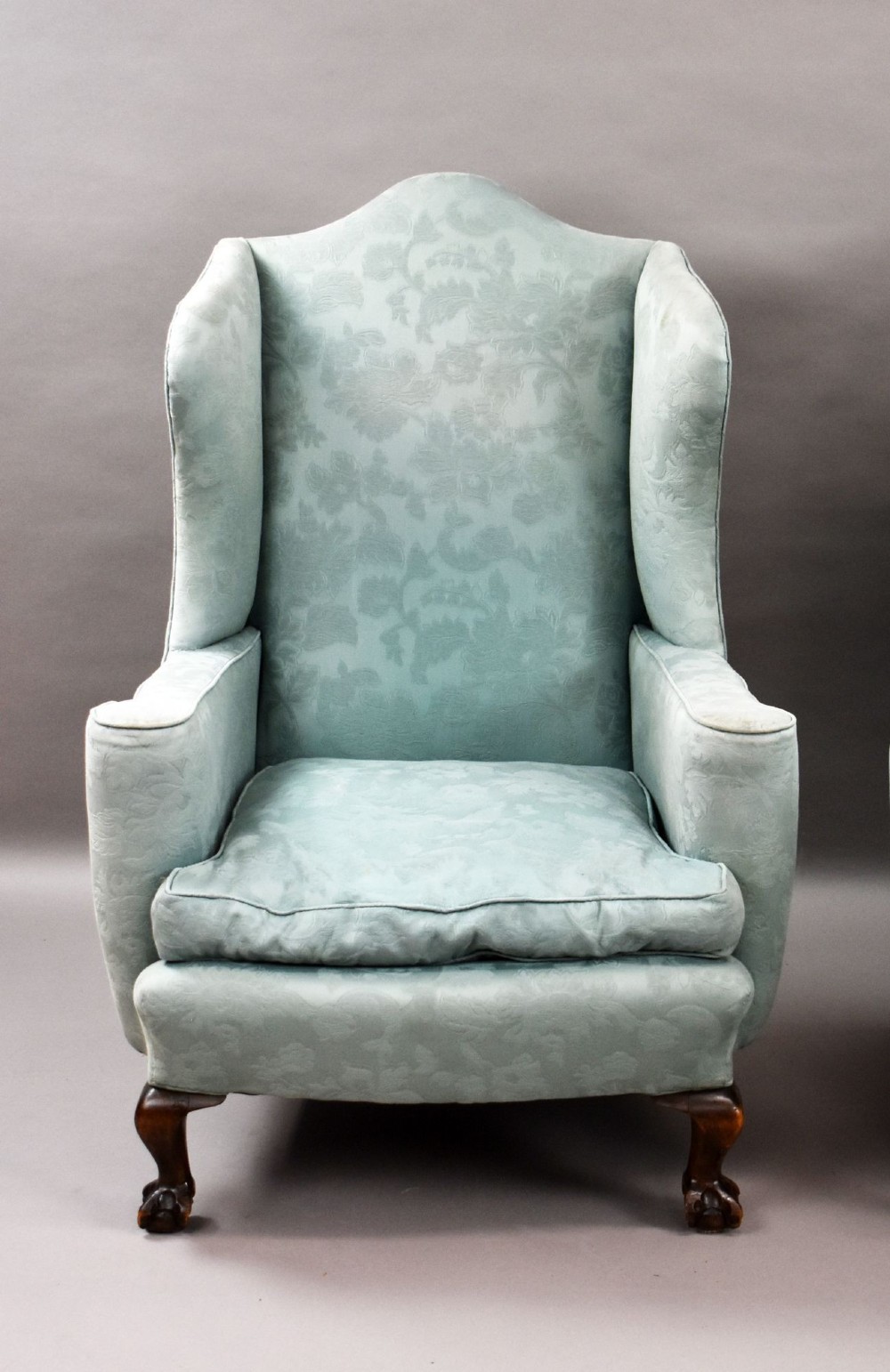 A pair of antique wingback armchairs upholstered in duck egg blue damask fabric with carved cabriole legs and ball-and-claw feet. View III