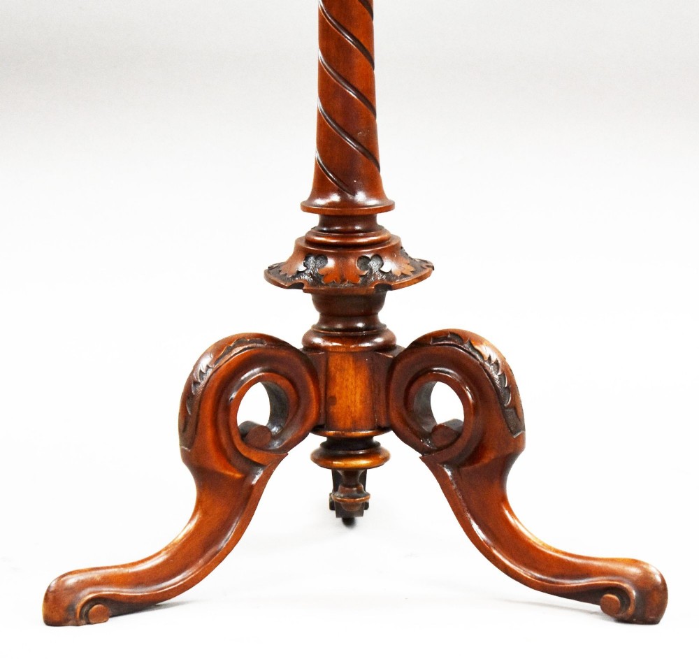 A Victorian burr walnut occasional table featuring a figure-patterned top, a barley twist carved stem, and a carved tripod base. View V