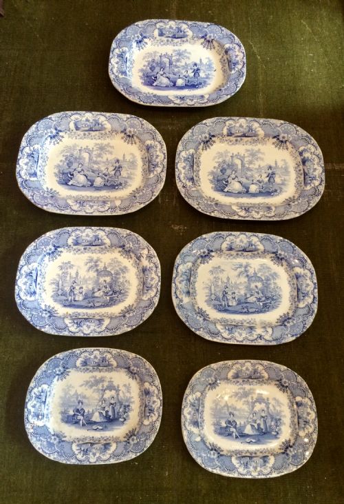 a set of seven decorative 19th century blue and white transferware platters - CATEGORY: ANTIQUE PLATES - DATED VICTORIAN