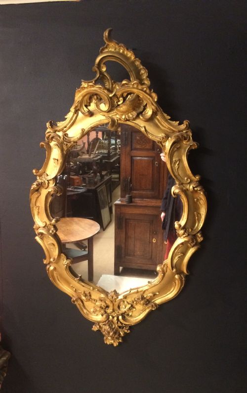 19th century oval carved giltwood mirror - CATEGORY: ANTIQUE MIRRORS - DATED 19TH CENTURY