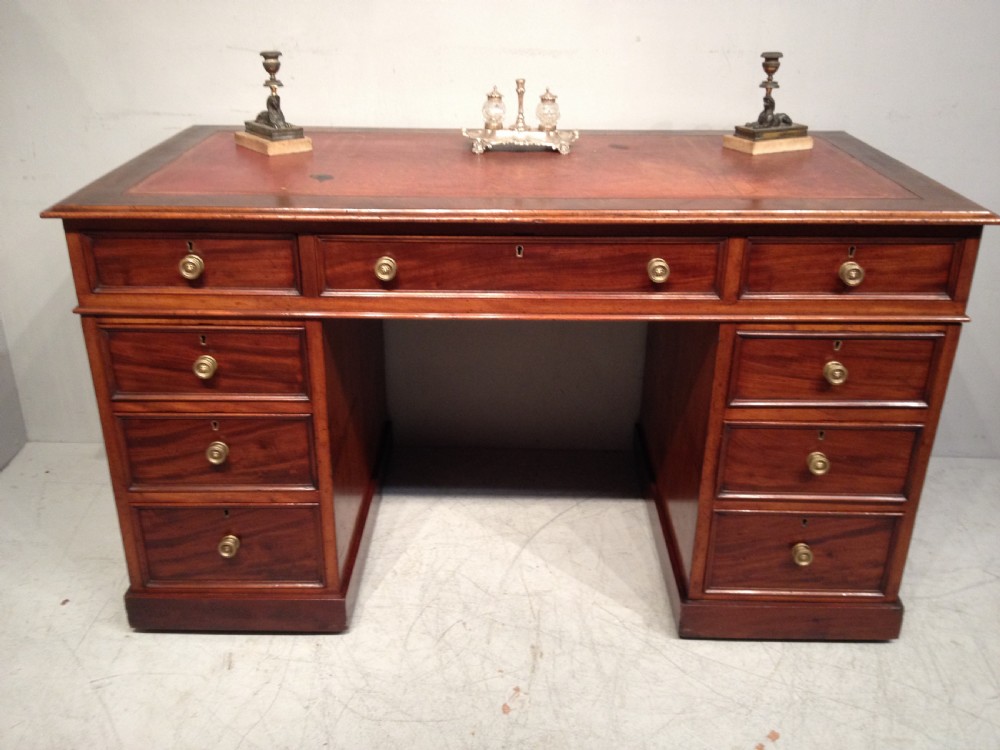 Early Victorian mahogany pedestal desk.