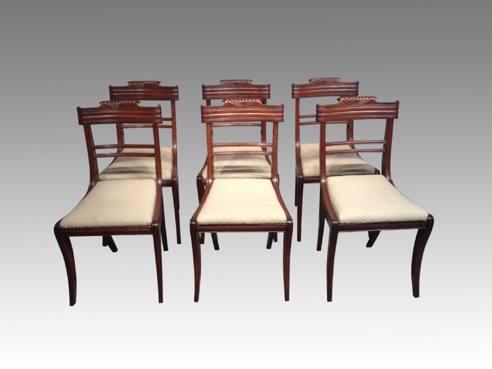 A set of six Regency mahogany dining chairs.
