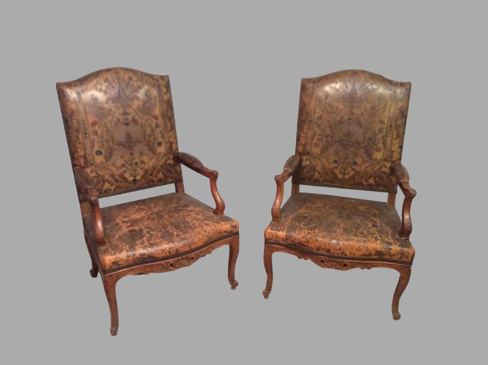 Pair of French oak cabriole leg library chairs.