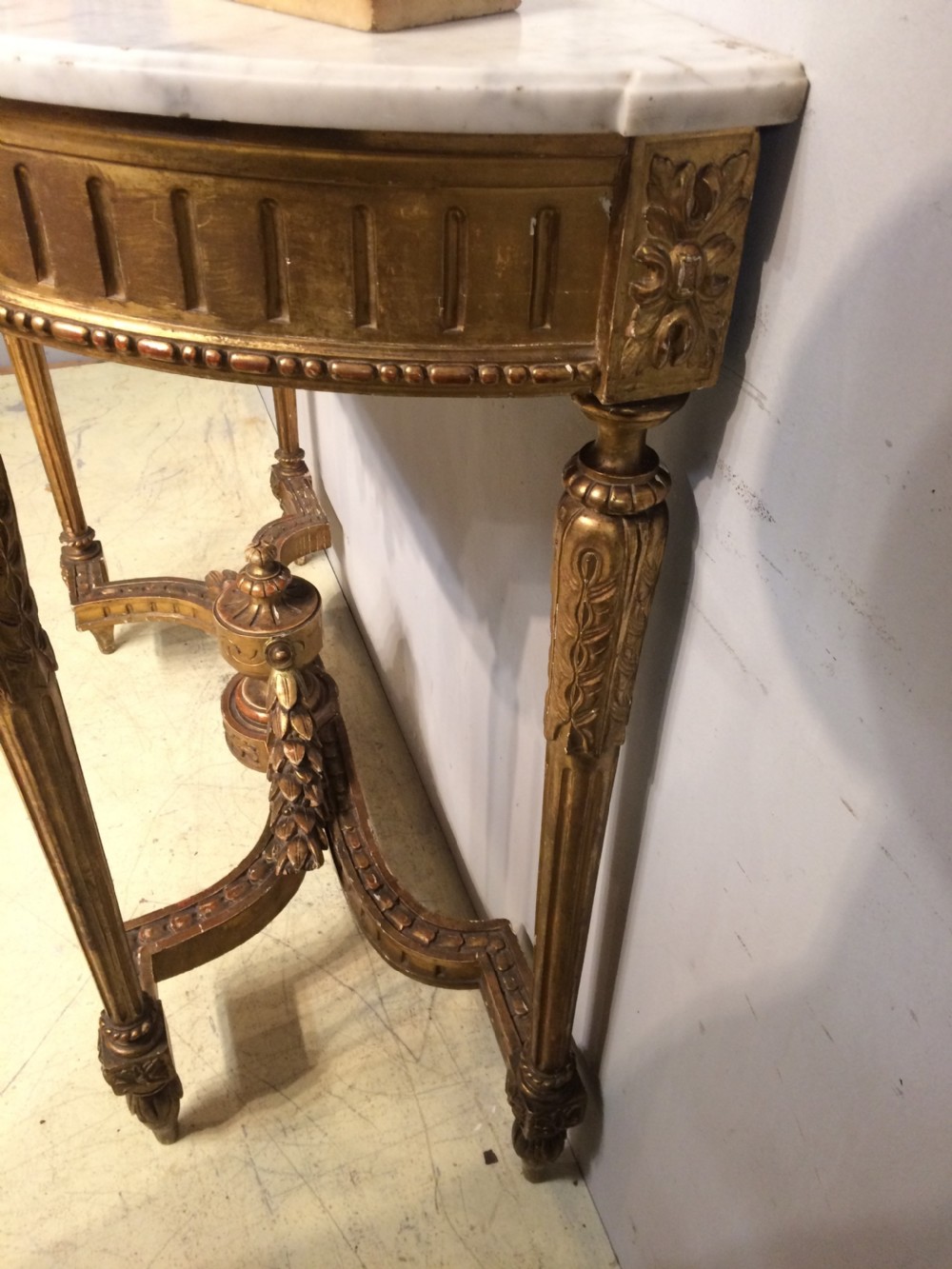 French carved giltwood console table with marble top. View IV