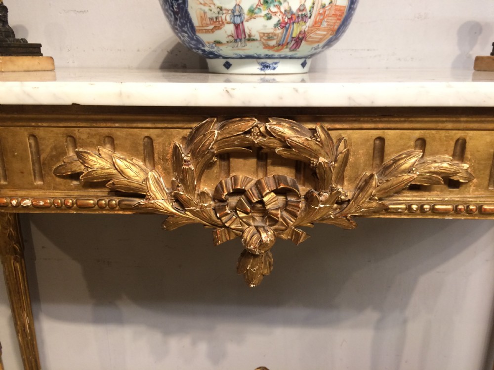 French carved giltwood console table with marble top. View V