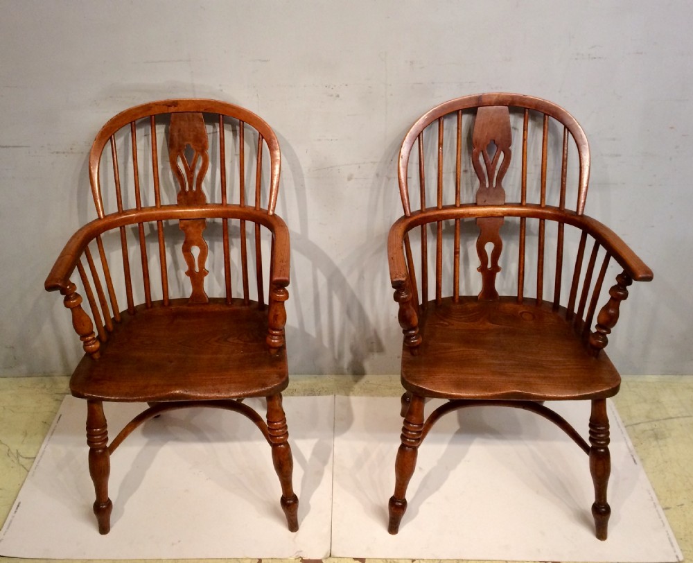 Pair of 19th century ash and elm low back  Windsor armchairs.