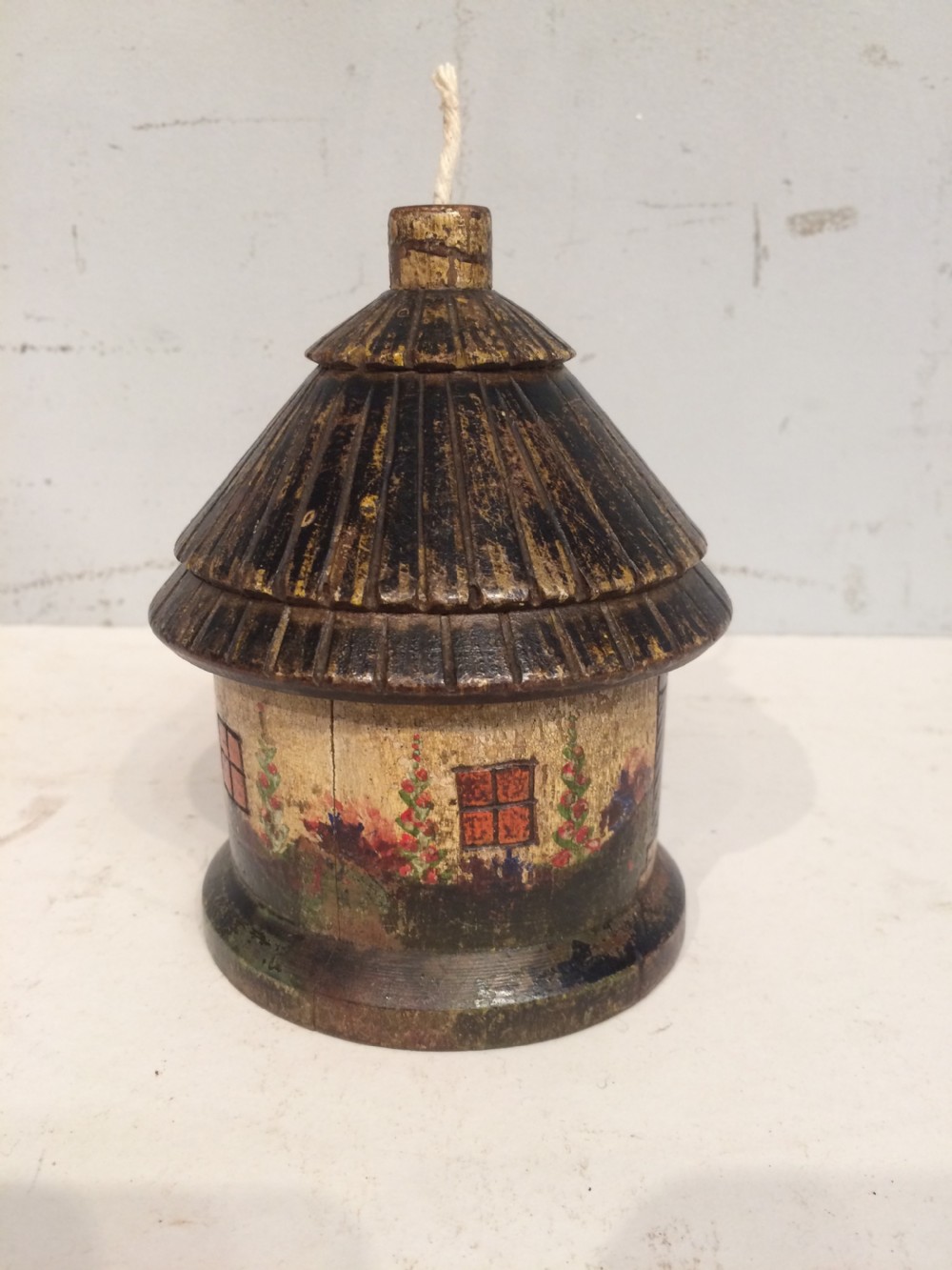 A 19th century painted treen string box. View II