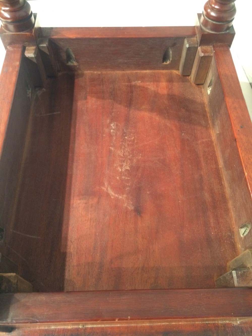 A small 19th century antique mahogany hall seat. View III