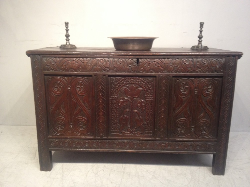 Charles II West Country carved oak coffer.