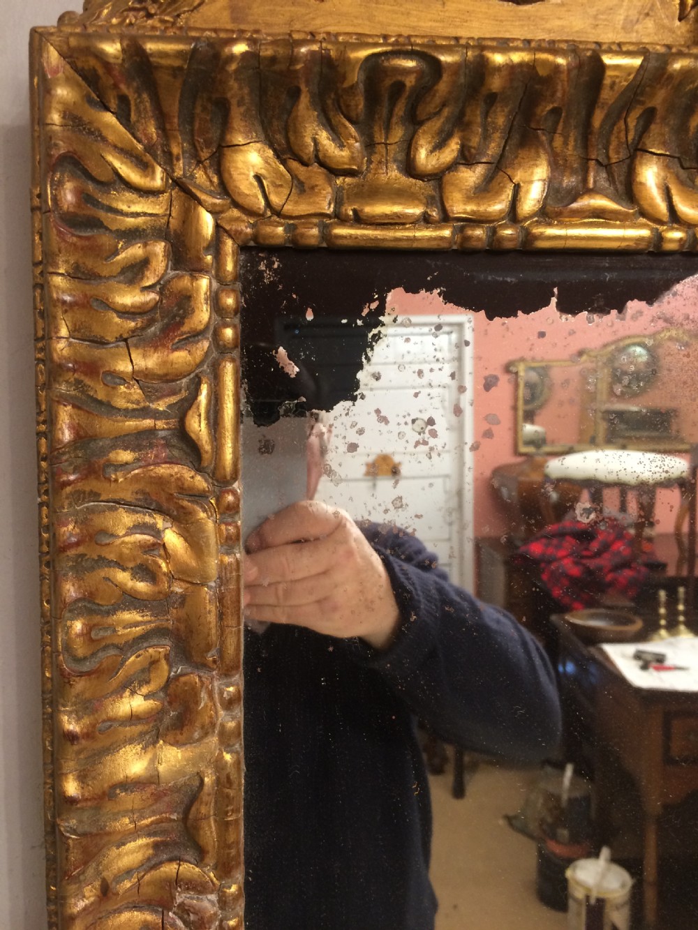 A decorative 19th century carved giltwood pier mirror. View VI