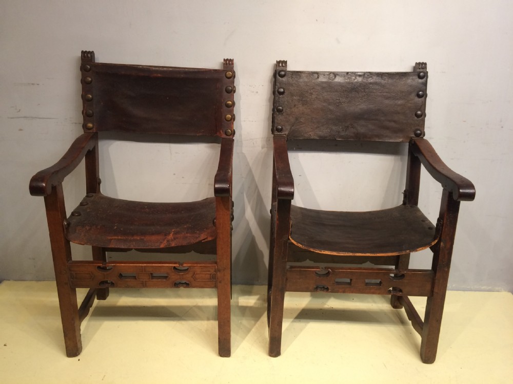 A near pair of  18th century Spanish walnut armchairs. View II