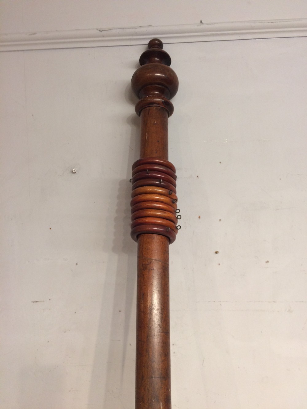 Large 19th century mahogany curtain pole. View II