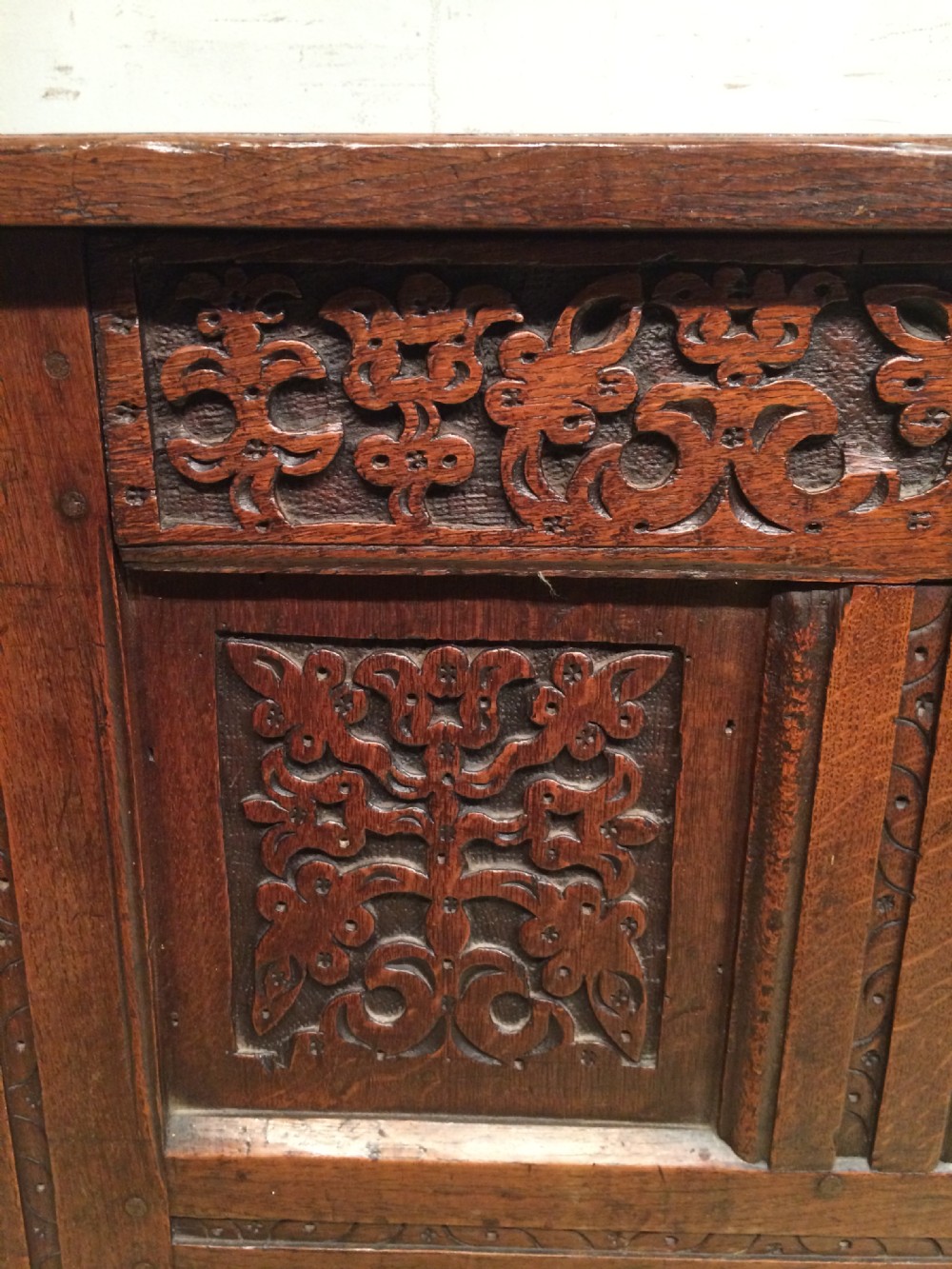 Small Charles II carved oak coffer.  View II